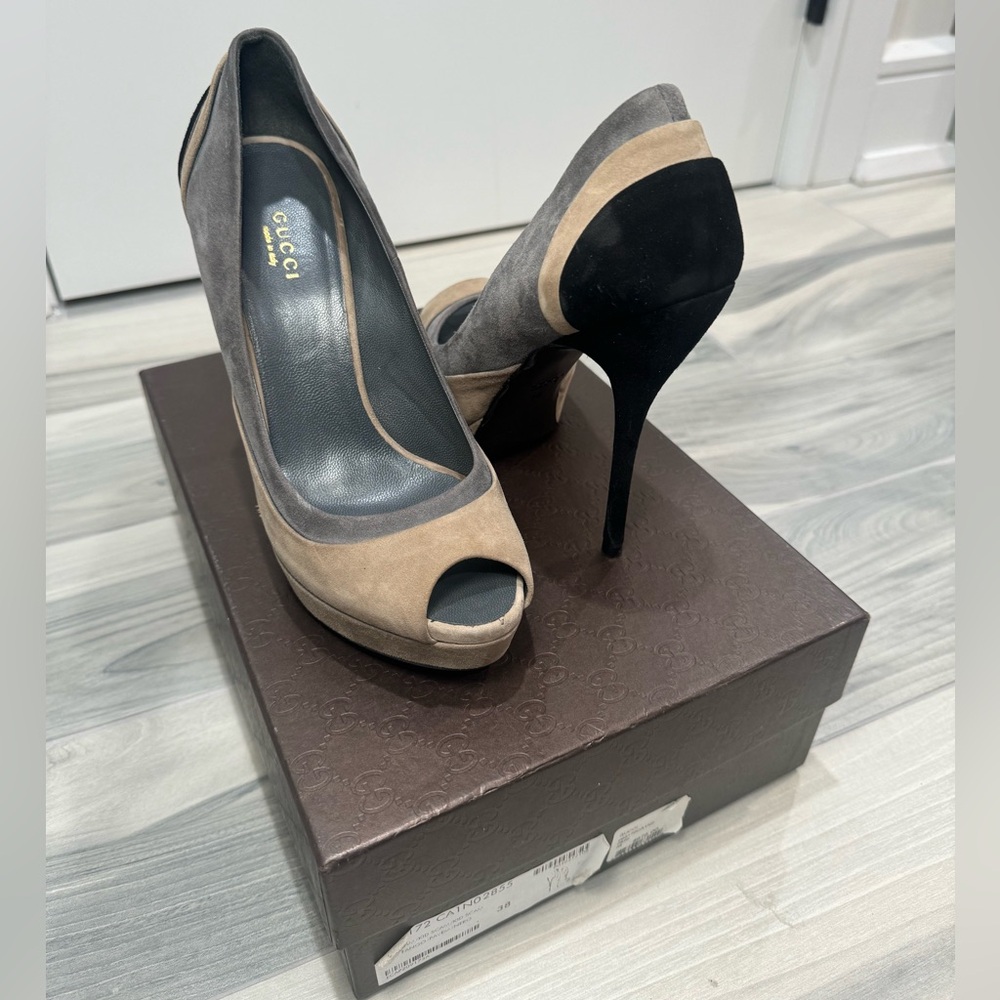 Gucci suade heels in the colors black, gray, and nude. Size 38.